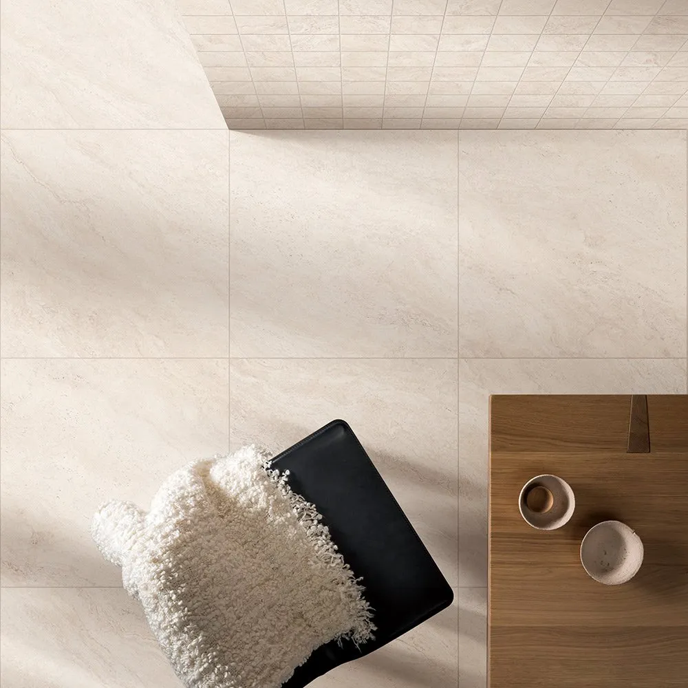 Close-up of rectified porcelain tile edge showing tight 1.5mm grout joint